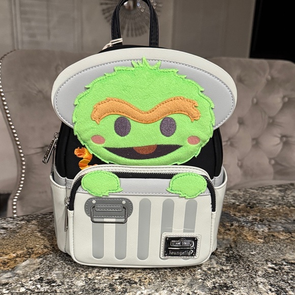 Loungefly Handbags - Loungefly OSCAR Grouch Sesame Street Mini Backpack Theme park Exclusive NWT